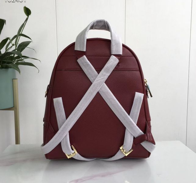 Женский рюкзак Michael Kors Rhea Zip G Bordeaux Lux 2527203633 фото